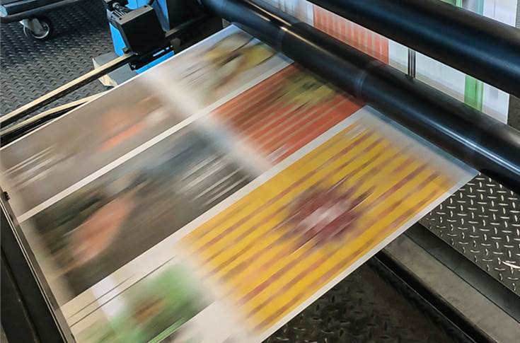 Advanced packaging printing press producing premium cartons and labels in industrial facility