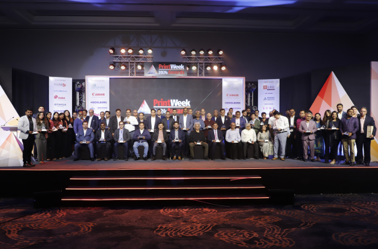 PrintWeek Awards Night 2024 celebrating print and packaging excellence, featuring Parksons Packaging as Company of the Year, Letra Graphix and other winners receiving Prisms, with industry professionals and students gathered for the ceremony attended by 350 representatives