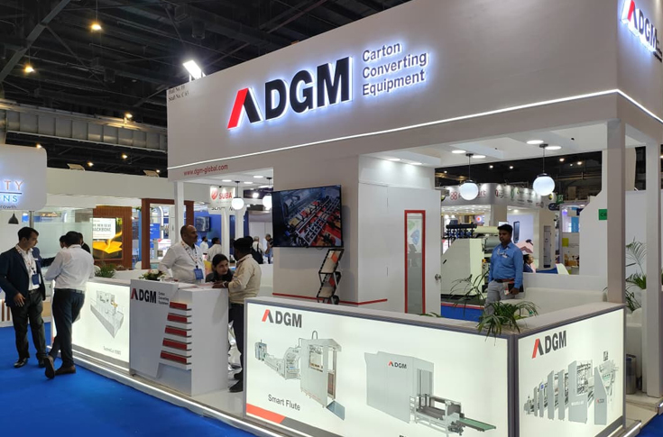 DGM India folder-gluer and die-cutter machine deals announced at trade exhibition, featuring orders from Canpac Trends and Safron Speciality Papers for expansion across India, showcasing automated corrugation and packaging machinery solutions