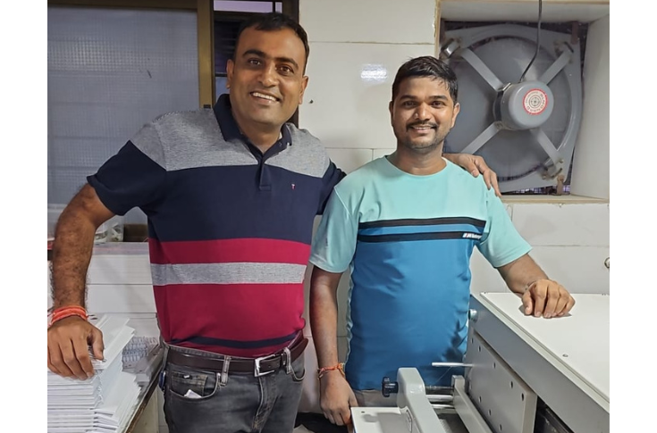 Prince Graphics printing and binding facility using Bindwel single-clamp technology for high-volume book production, including large educational and pharmaceutical print orders