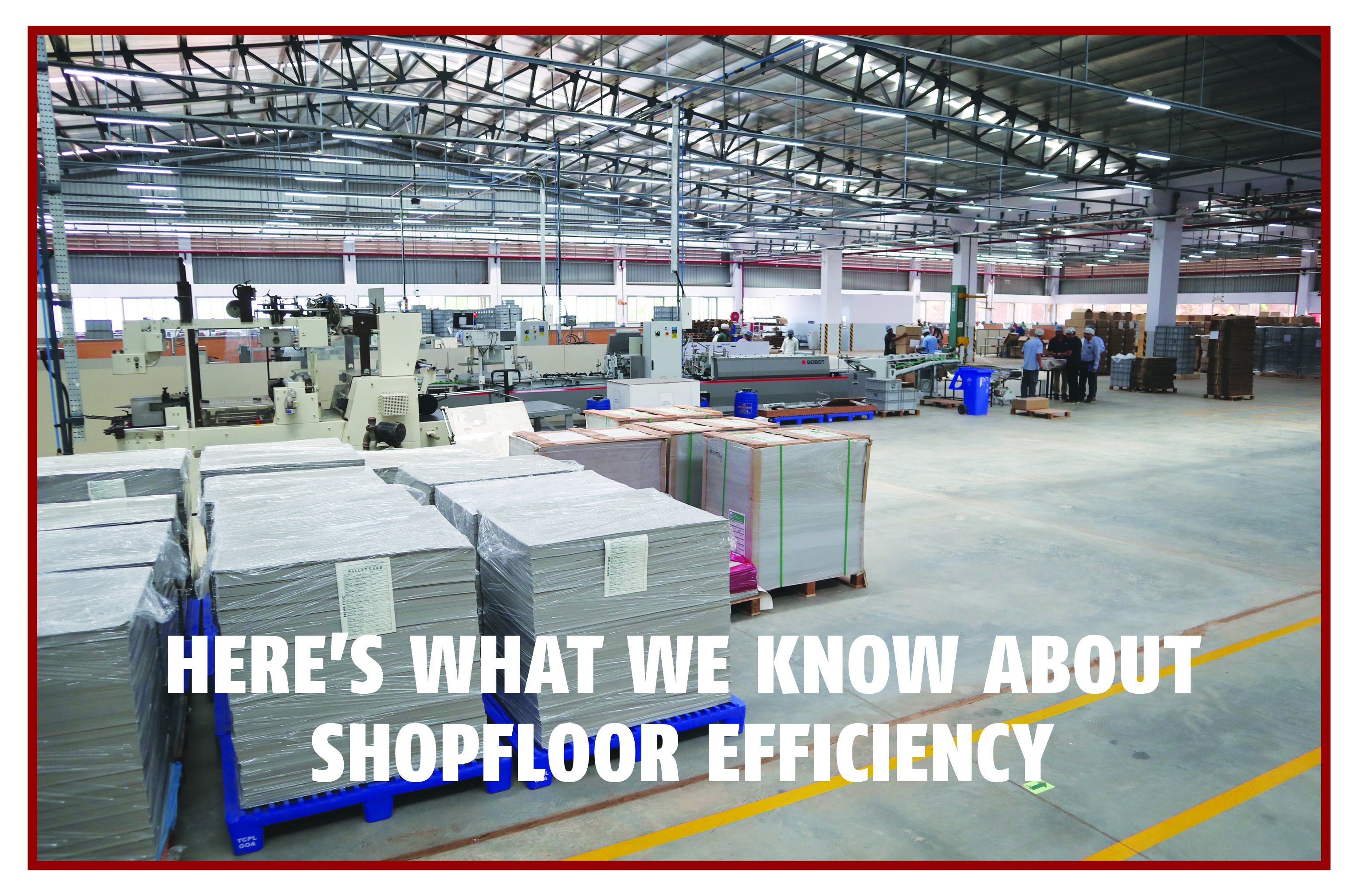 Modern print manufacturing shopfloor using automation, OEE monitoring, ERP systems, and advanced machinery to improve efficiency and productivity