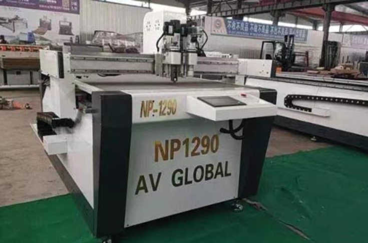 Digital cutting machine for packaging samples showcased at PrintPack India 2025 with cutting and creasing features for corrugated, foam board, leather, and other materials