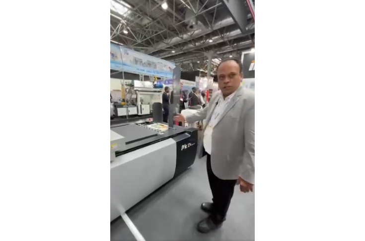 Tushar Pande of Emerging Graphics presenting IECHO PK IV digital cutting machine at Drupa 2024 exhibition booth