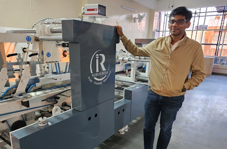 Grand Prints packaging facility in Gurgaon using Robus automatic folder-gluer for pharmaceutical and FMCG carton production, supporting die-cutting, finishing, and short-run as well as high-volume packaging formats
