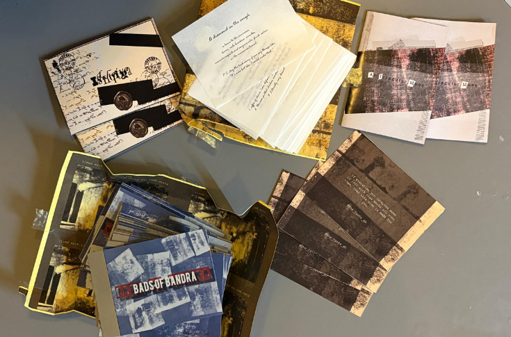 Independent zine-making scene in Mumbai featuring handmade mini-magazines and artist booklets displayed at art pop-ups and flea markets, showcasing DIY publishing, creative self-expression, and alternative literary culture outside traditional publishing systems