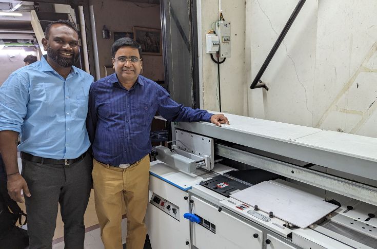 Bindwel Blue Chip perfect binding machine used in a Pune print facility to support short-run book printing and post-press automation