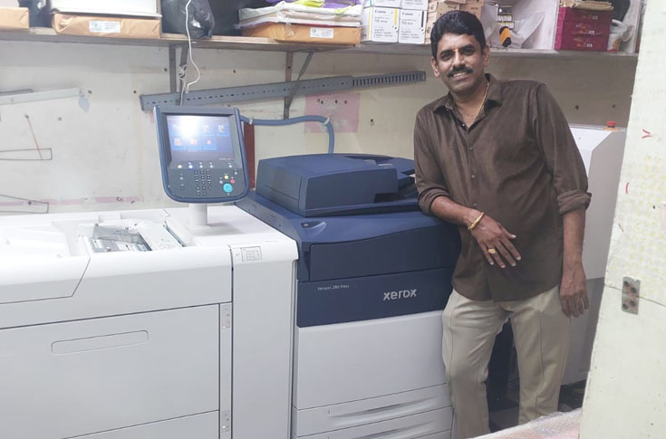 Express Colour Zone printing facility using Xerox digital press systems for speciality colour, commercial printing, and diverse applications like brochures, labels, and large-format output