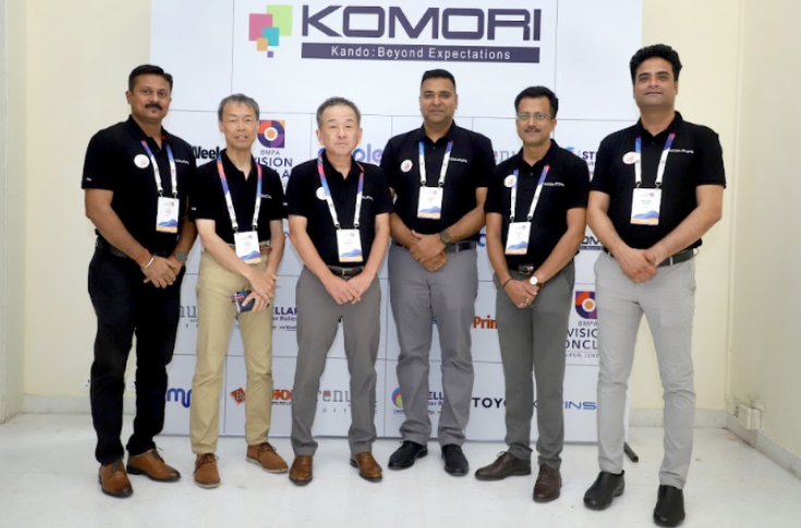 Komori India showcasing LP-140 high-speed thin paper printing press, Perfector 40 two-sided offset press, and KP-Connect workflow software for real-time production control at Pamex