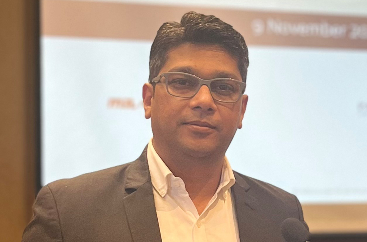 Maxcess India display at Labelexpo India 2024 featuring defect detection system, Fife500 Max web guide, and RotoAdjust automation technology for label printing, focusing on Industry 4.0, waste reduction, and production efficiency