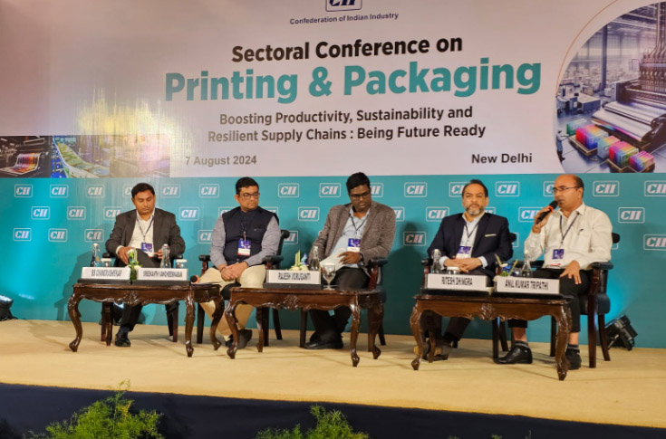 Industry conference discussion on India’s printing and packaging sector showing manufacturing insights, supply chain integration, and presentations on policy recognition and industrial growth trends