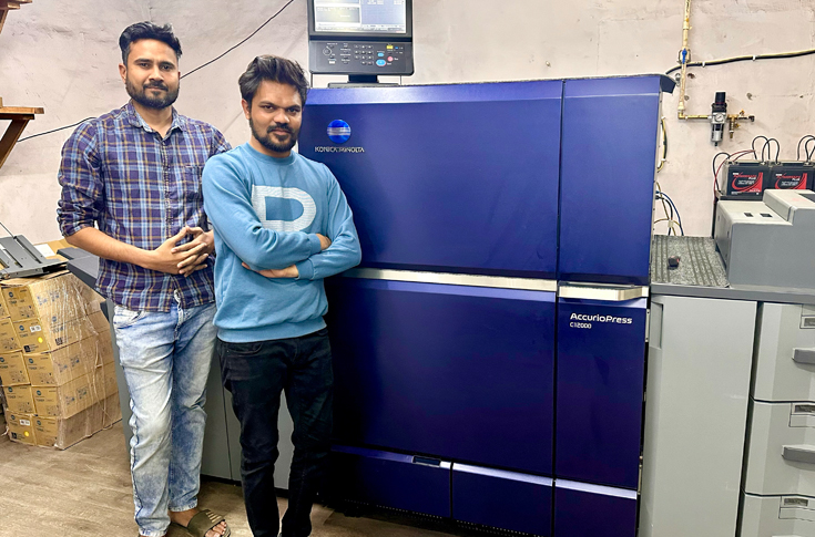 Plus Point Imaging operating the Konica Minolta AccurioPress C12000 for short-run textile catalogues and poster printing