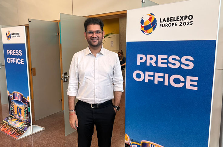Letra Graphix director discussing digital print adoption, hybrid press learning curve, and packaging innovations like EcoLeaf and Signite at an industry trade show