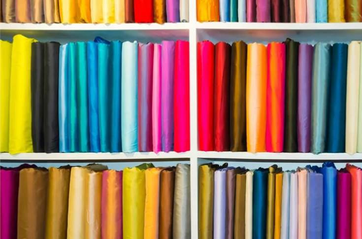Meerut-based Rachit Prints textile manufacturing facility producing knitted and printed fabrics for mattress industry clients, with advanced global machinery and fabric production lines