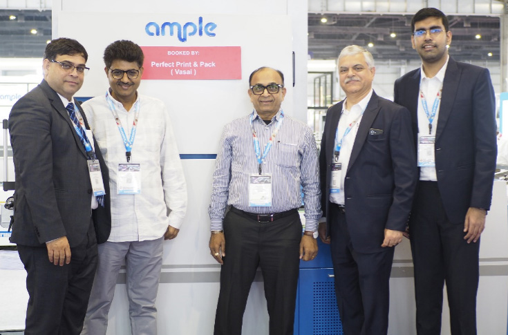 Ample Graphics displaying advanced laminators, cold foil systems, UV coating machines, and rigid box-making solutions at PrintPack India 2025