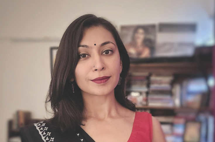 Researcher studying Delhi’s Daryaganj Sunday Book Market, highlighting used books, informal book trade, and diverse literary genres including pulp fiction, comics, and academic texts