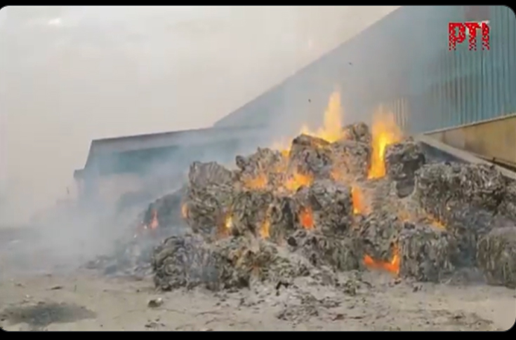 Fire incident at Lemit paper mill warehouse showing large-scale blaze involving waste paper stock, with Morbi Fire Brigade responding to control the industrial fire