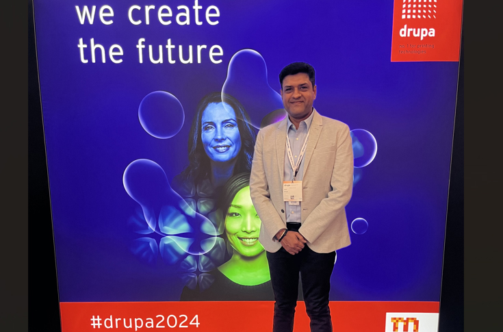 Epson display at Drupa featuring digital inkjet printing solutions including Monna Lisa 13000 textile printer, SureColor V1000 UV printer, and SureColor F10000 dye-sublimation printer for industrial and commercial applications