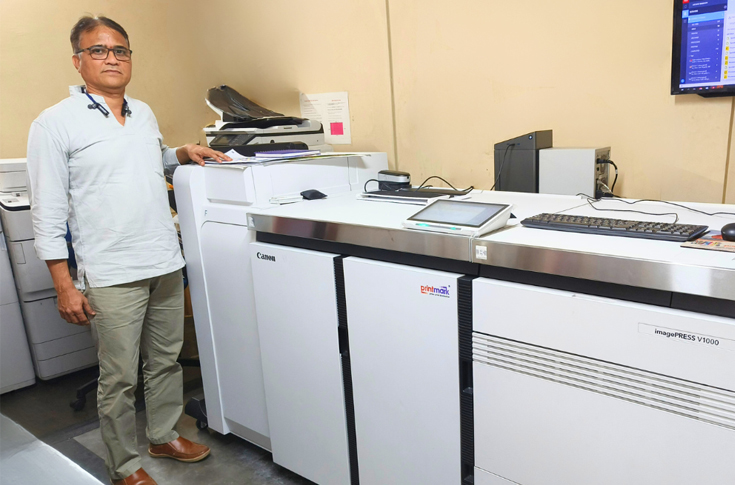 Canon ImagePress V1000 digital printing press used by Printmark for high-quality output across diverse substrates including metallic and PVC sheets