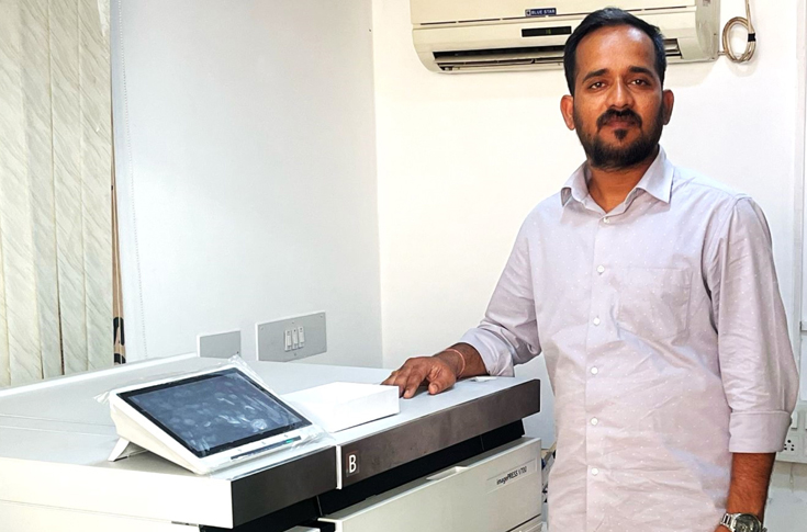 D2 Designs using Canon ImagePress V700 digital press for high-resolution printing of invitation cards, business materials, customised diaries, and graphic design products