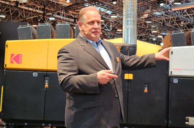Kodak Optimax pre-coater and Prosper Ultra 520 inkjet press demonstrating inline coating, printing, folding, and finishing solutions for high-speed production workflows at Drupa