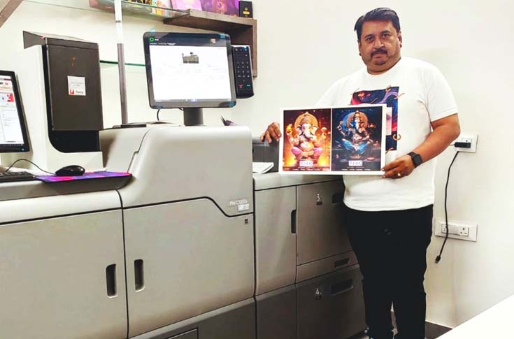 Kapil Arora of JMD Purple Strokes with the Ricoh Pro C7200x digital production press installed by Monotech Systems, showcasing advanced fifth colour printing and high-quality commercial graphics production