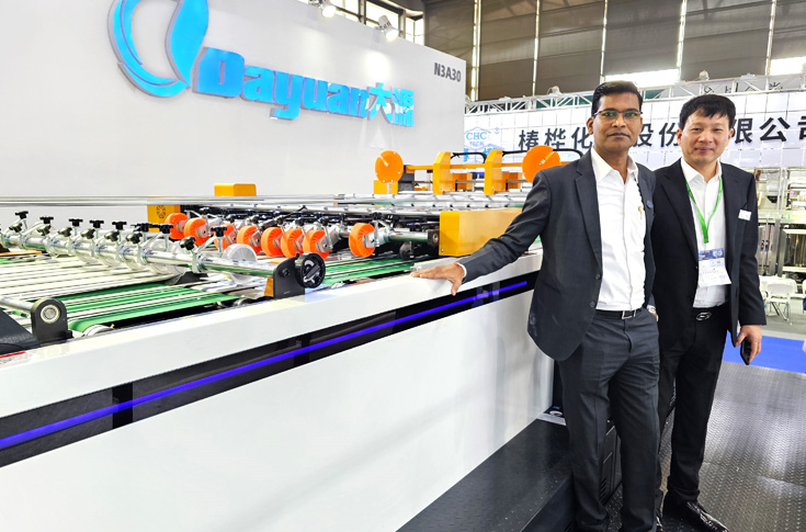 Robus India display at China Print 2025 featuring advanced die-cutting and folder-gluer machines from OEM partners Dayuan and YCIA, demonstrating automated setup, Braille printing, and high-precision packaging solutions