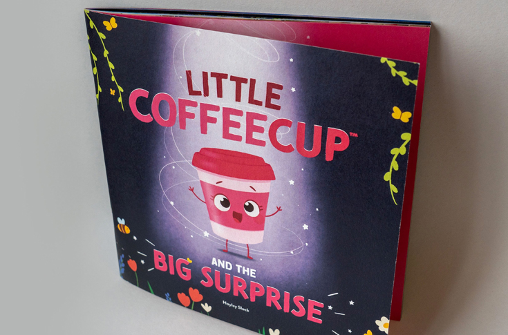 Children’s book titled “Little Coffee Cup and the Big Surprise” featuring a coffee cup character, printed on recycled coffee cup paper, highlighting sustainability and circular economy concepts