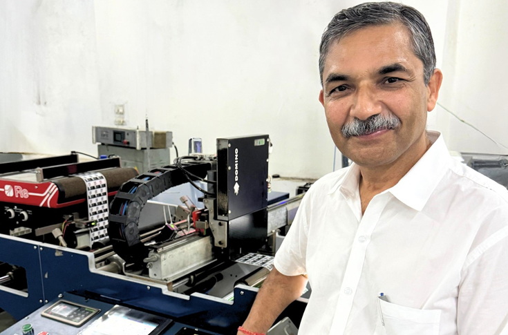 SNT International label production facility using the Domino K600i monochrome digital printer for high-speed variable data printing, enabling faster turnaround of large label orders and improved efficiency compared to Thermal Transfer Overprinters (TTO) systems