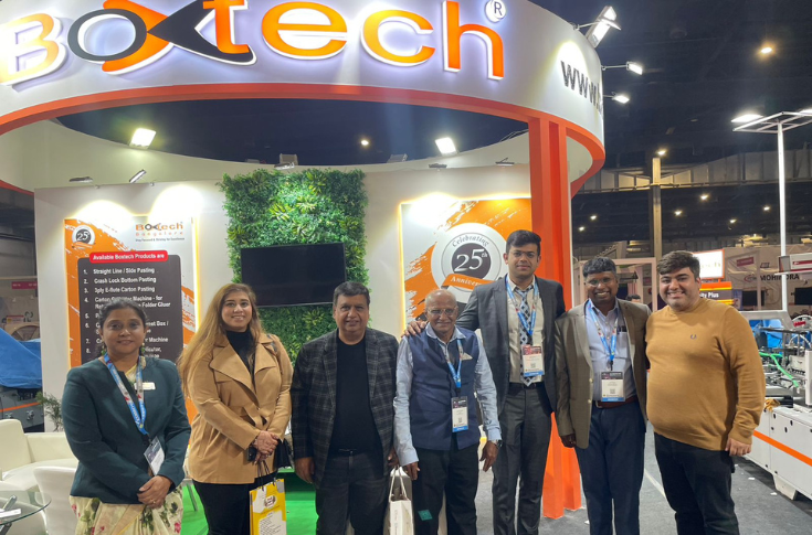Boxtech presents the Velocity+ high-speed carton folder-gluer with automation features including crash-lock bottom, electronic gluing system, and inline leaflet insertion unit