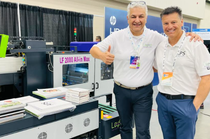 Layflat.com LF 2000 All-In Max and TP 450 VS post-press systems demonstrated at HP VIP Event Indianapolis 2024, featuring lay-flat book block production, softcover glue unit, and V-shape spine binding technology for commercial and photo books