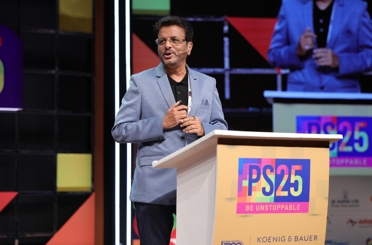 Iqbal Kherodawala with Khushru Patel of Jak Printers and K. Selvakumar of Lovely Offset at the ITK Show, discussing leadership, innovation, and impactful contributions to the Indian printing industry