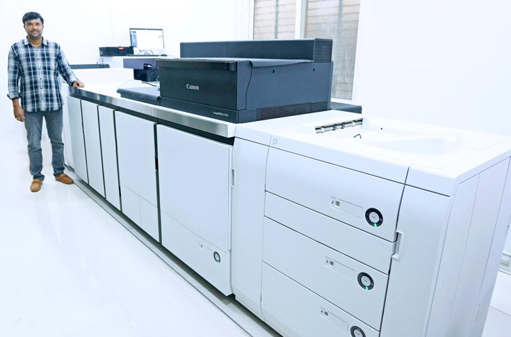 Overview of Zoom Digital Press operations using Canon ImagePress V1350 digital printing press with EFI Fiery E9000 workflow system, enabling high-precision colour printing, front-back registration accuracy, and production of commercial print products like visiting cards and photo albums with consistent quality control