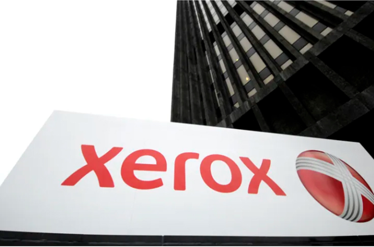 Xerox financial performance update showing decline in Print and Other sales, improved operating margins, CEO Steve Bandrowczak discussing Reinvention strategy and revised annual revenue guidance