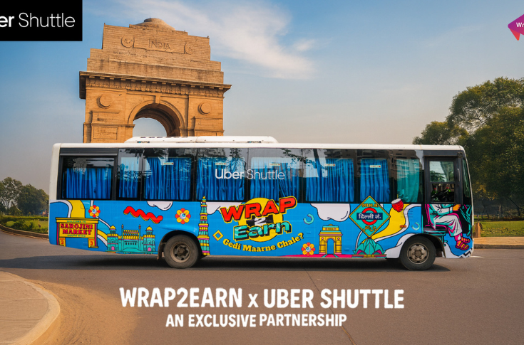 Fleet of Uber Shuttle buses in Delhi NCR and Kolkata featuring exterior and interior advertising managed by Wrap2Earn, targeting corporate professionals during daily commutes