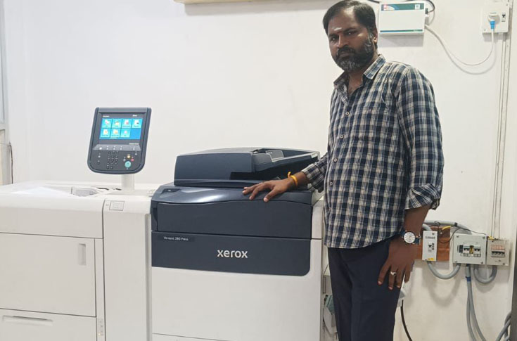Print Dots production facility with Xerox Versant 280 digital press producing short-run corporate materials like visiting cards, catalogues, and brochures