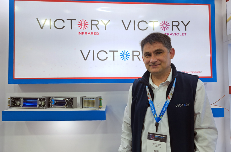 Victory Lighting display at PrintPack 2025 featuring high-power LED curing units, twin tube infrared lamps, and UV curing systems for printing applications, emphasizing sustainable mercury-free lighting solutions for the print industry