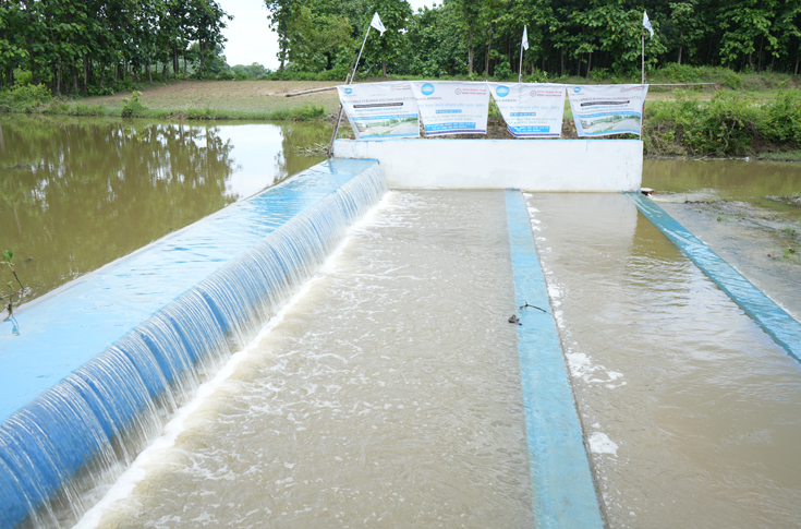 Konica Minolta’s Pravah sustainability initiative showing check dams constructed for rainwater harvesting and groundwater recharge in rural areas, supporting water conservation, organic farming, and improved livelihoods for local communities through SDG-aligned development efforts