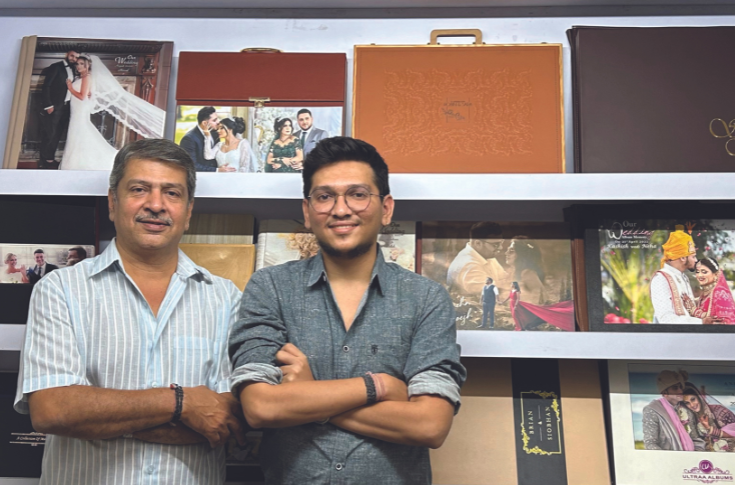 Rajiv Panchal showcasing handcrafted flush-mount wedding albums and premium layflat photo books produced by Ultraa Albums for customers in India and international markets